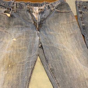 2 pair worn Cinch jeans.